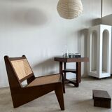 Reclined armchair in canned teak in natural wood