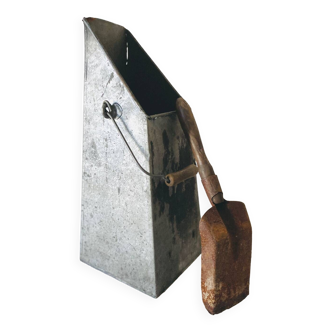 Old zinc coal bucket with wooden handle and shovel
