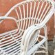 Deux fauteuils en rotin blanc