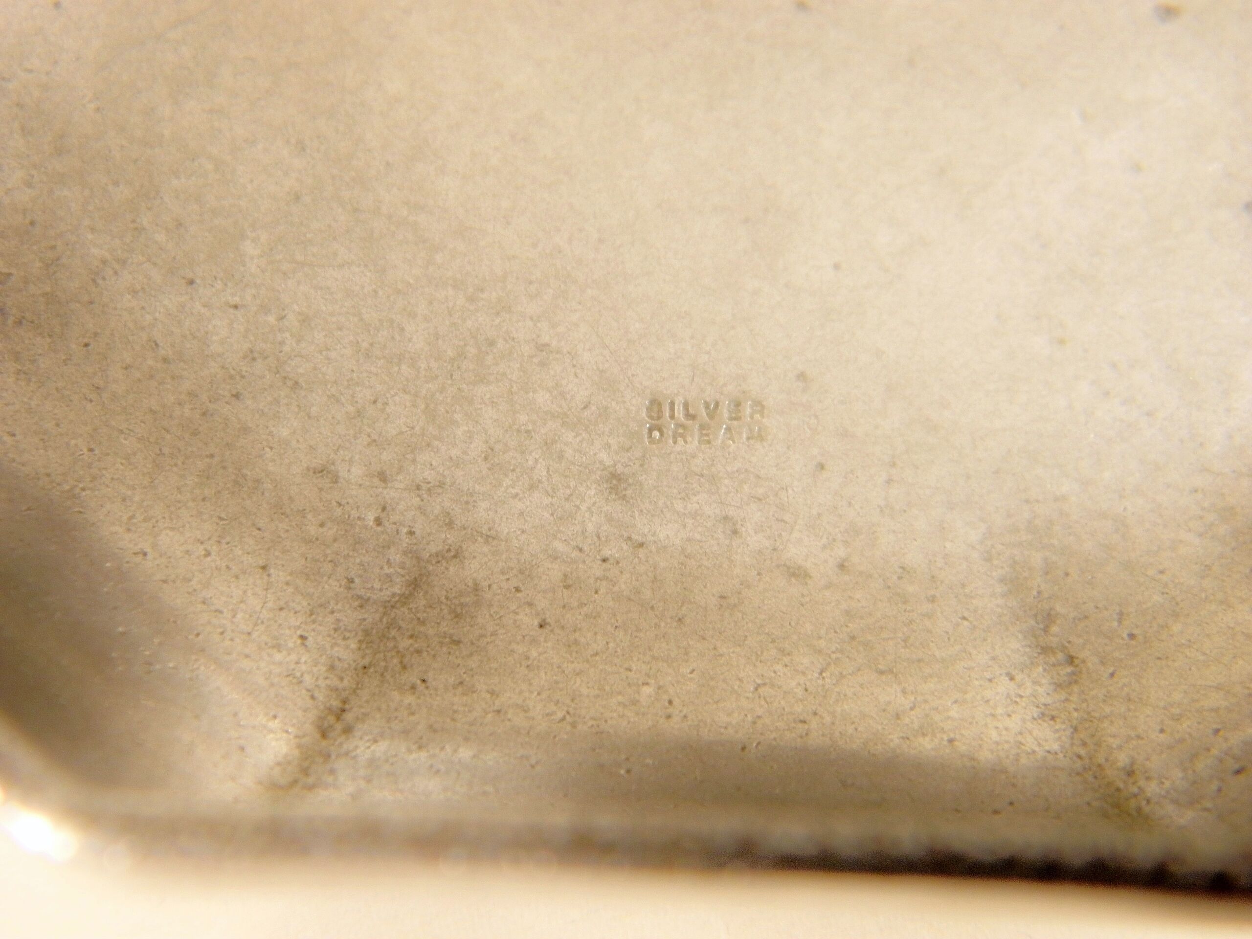 Silver empty-pocket cup