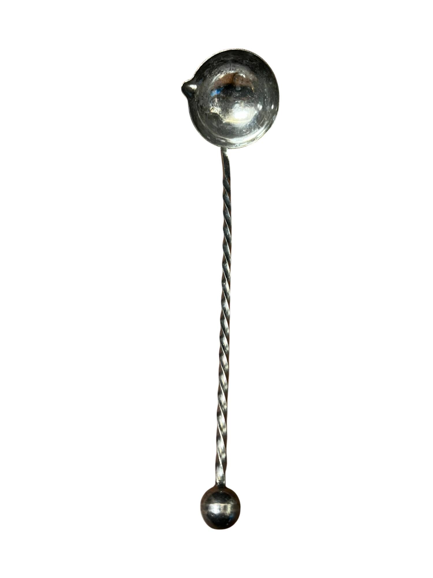 Silver metal ladle