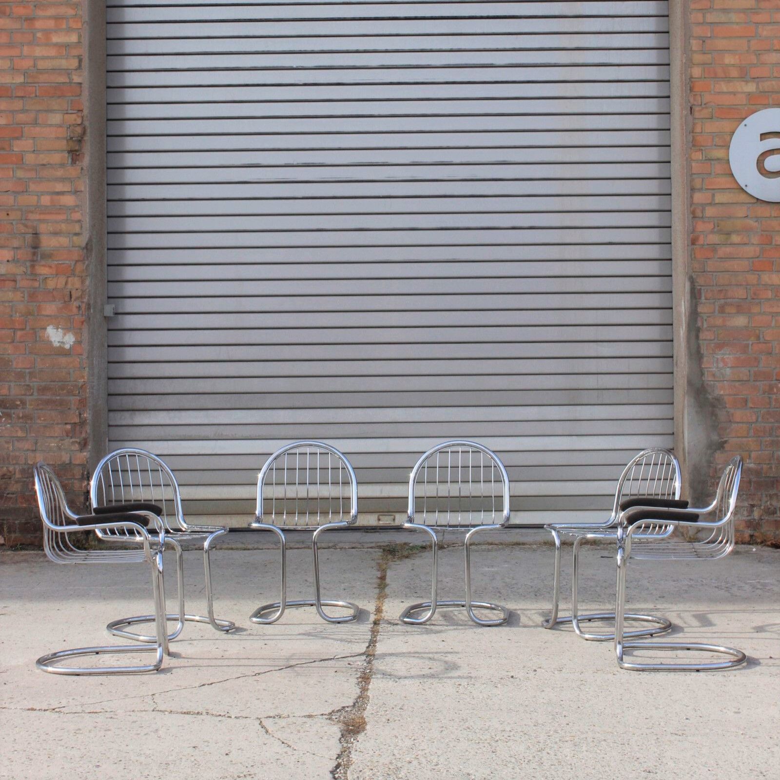 4 chairs & 2 armchairs in chrome-plated steel wire by Gastone Rinaldi, Italy 1970s