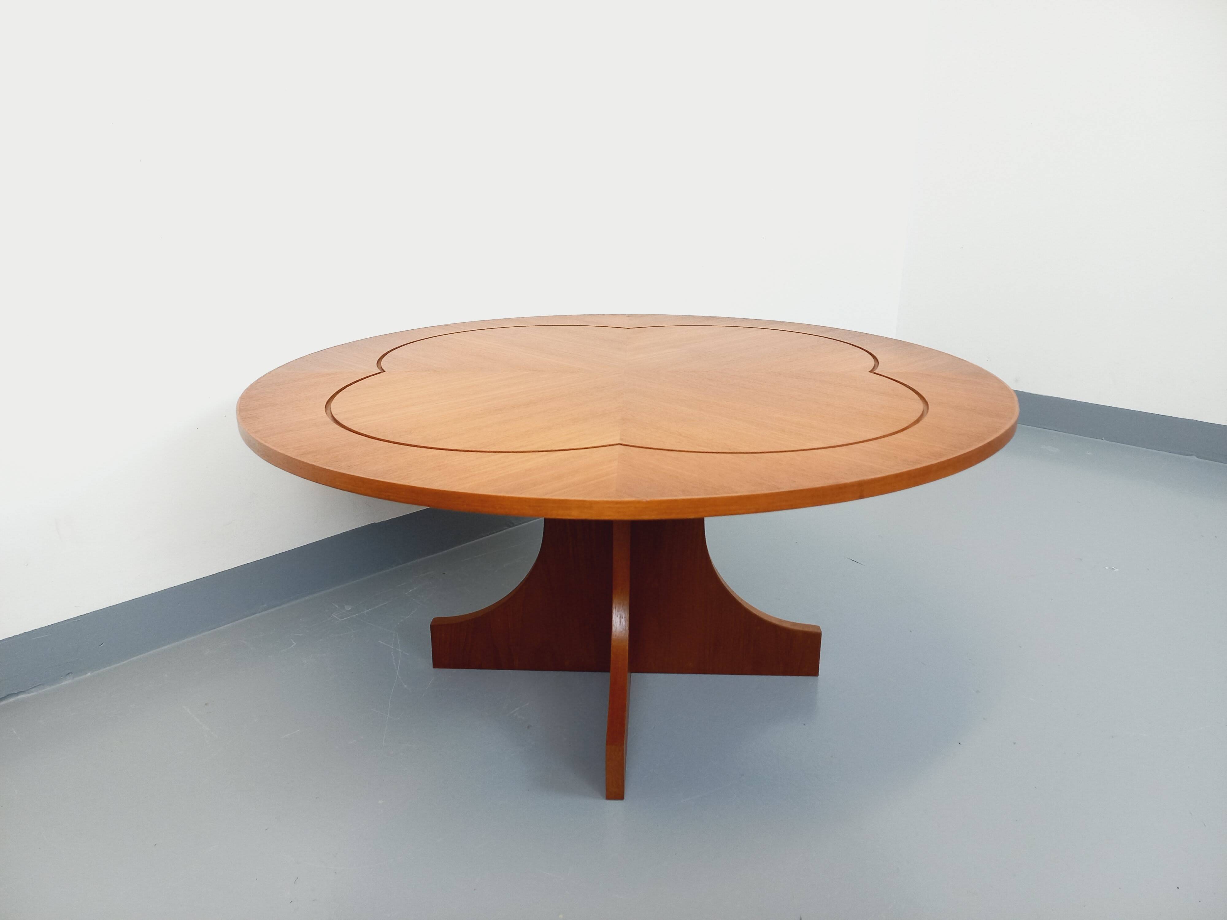Vintage English round teak coffee table from the 1960s