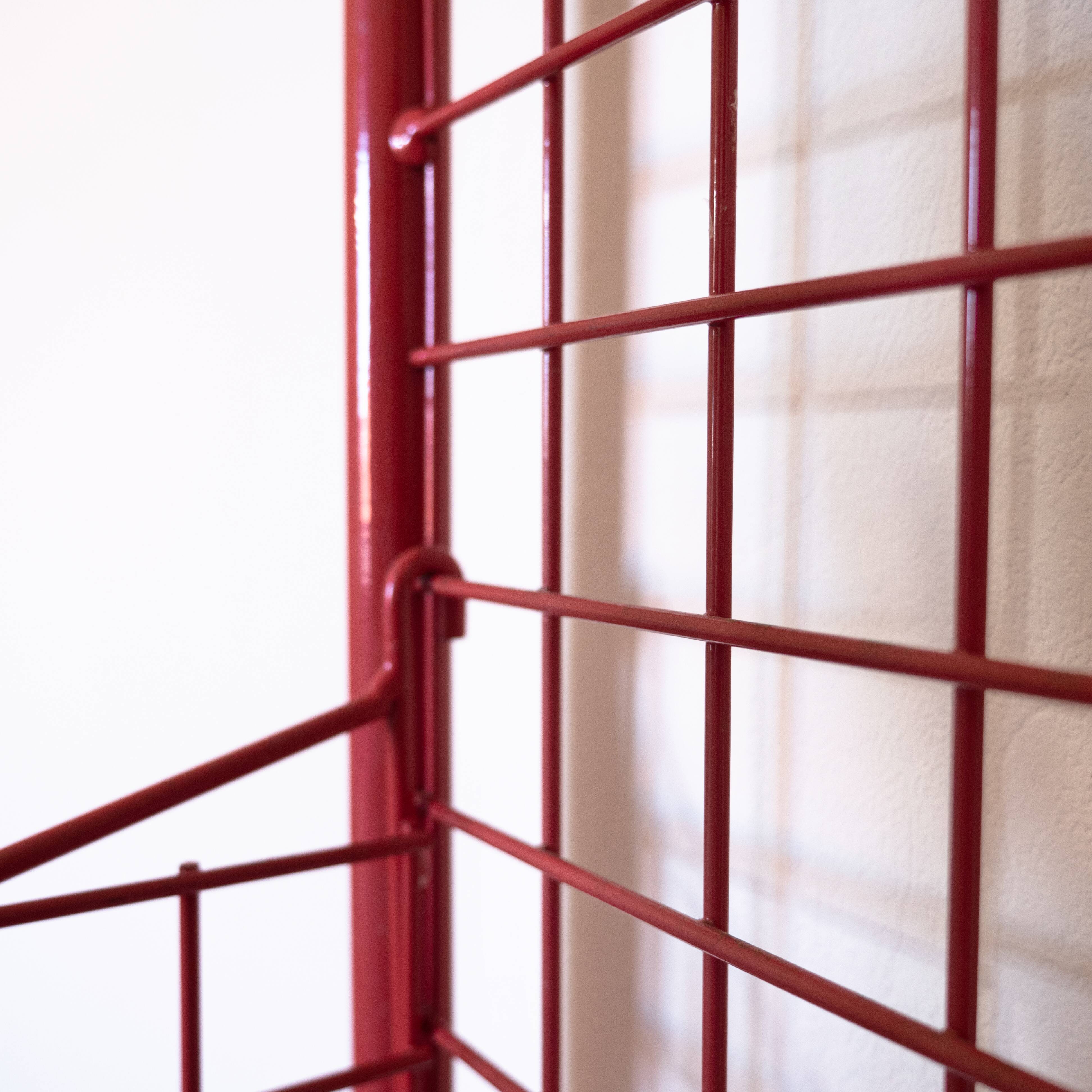 Red mesh metal grocery shelf