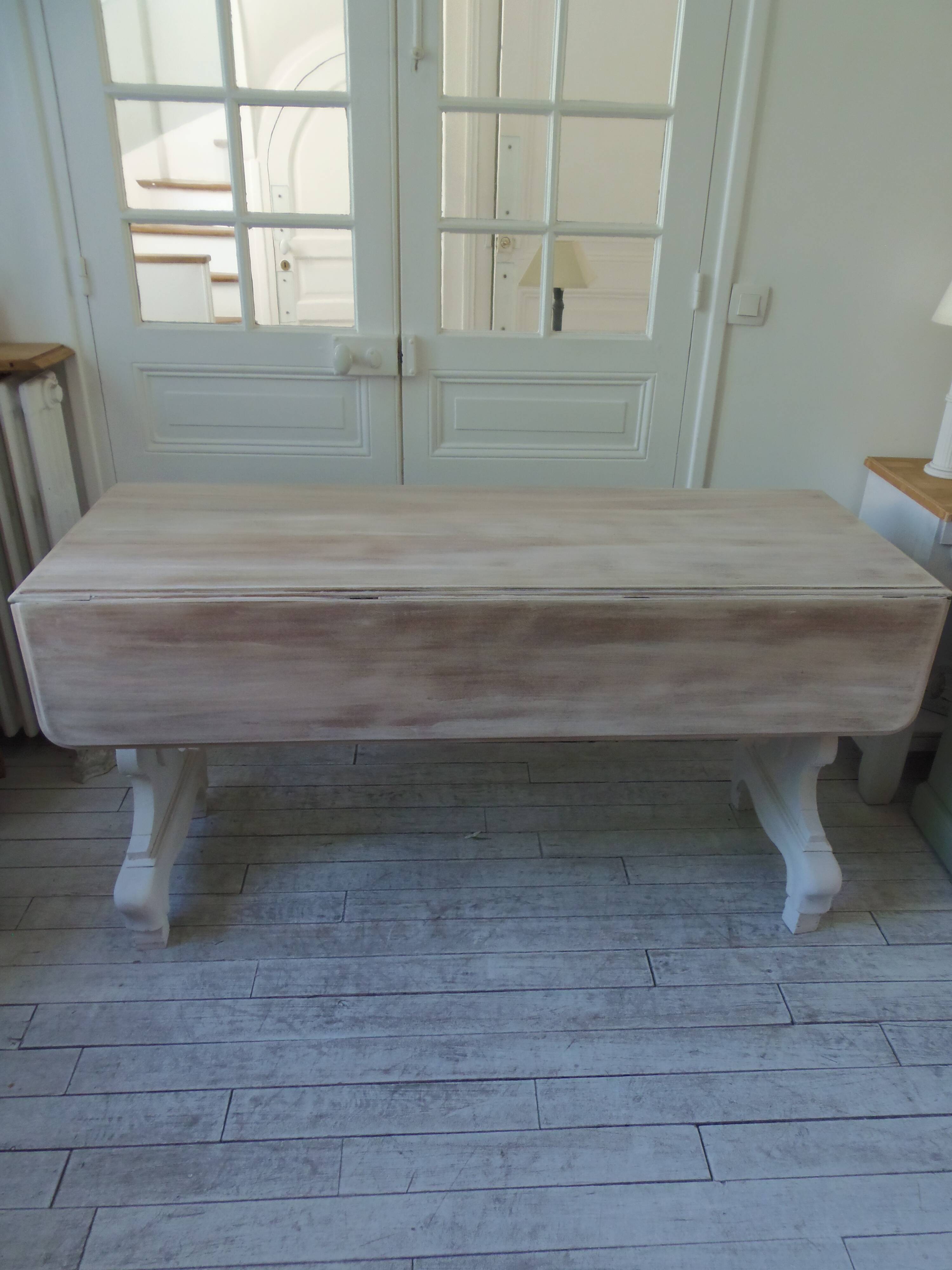 Console, solid walnut table, foldable extensions, grey patinated legs.