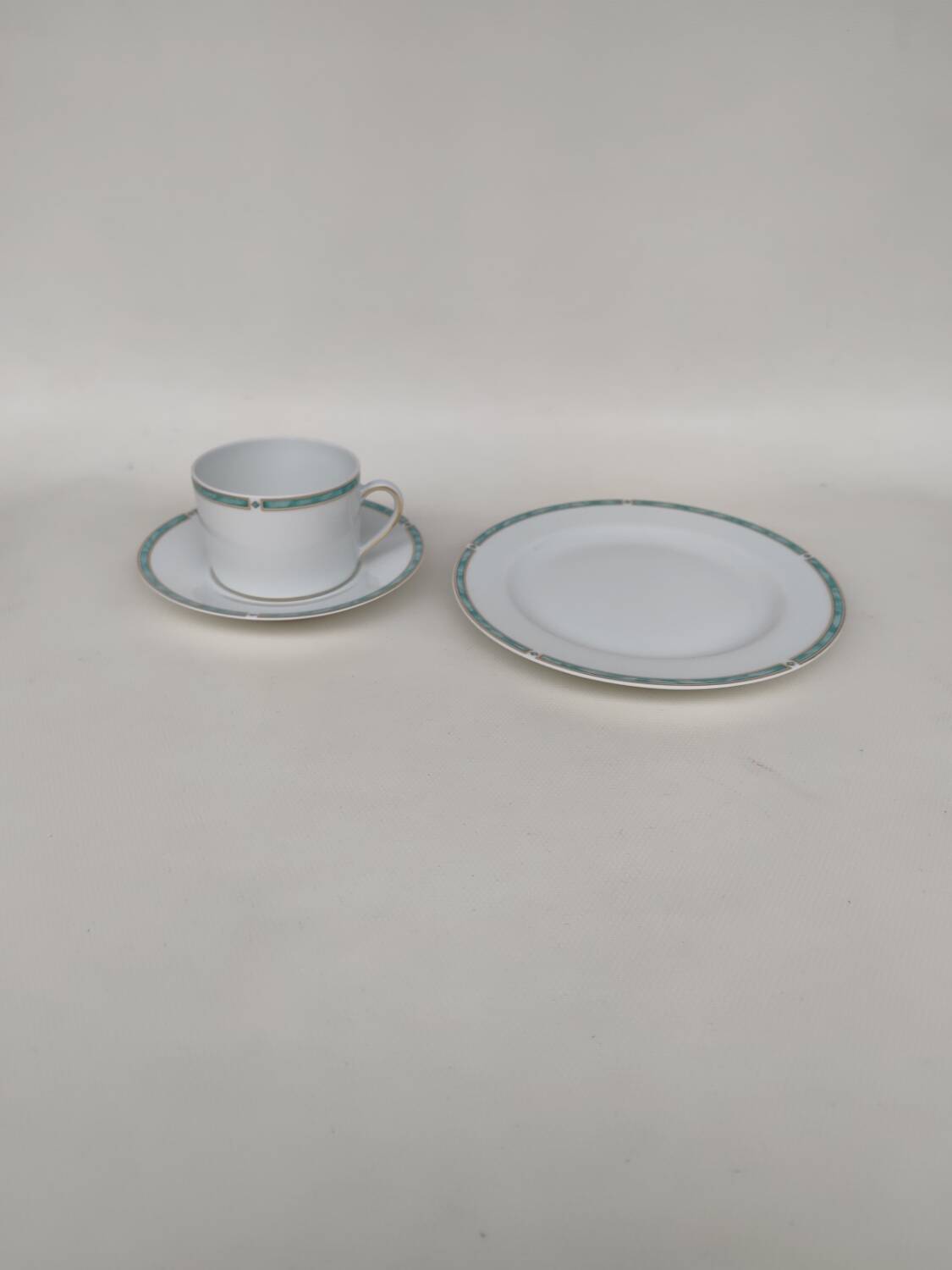 Three-piece Limoges porcelain set. By Bernardaud.