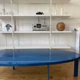 Oval coffee table in blue lacquered wood