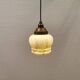 Small Art Deco hanging lamp in cream colored glass with bakelite top. Estimated 1950s
