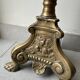 Gilded bronze candlestick with cherub trio decoration