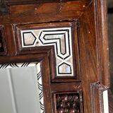 Oriental mirror in carved and turned wood inlaid with mother-of-pearl H 44/L 38 cm