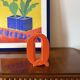 Space age orange Q letter shaped ceramic vase, Marcel Radureau France 1970