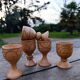 5 wooden egg cups from the 50s/60s.