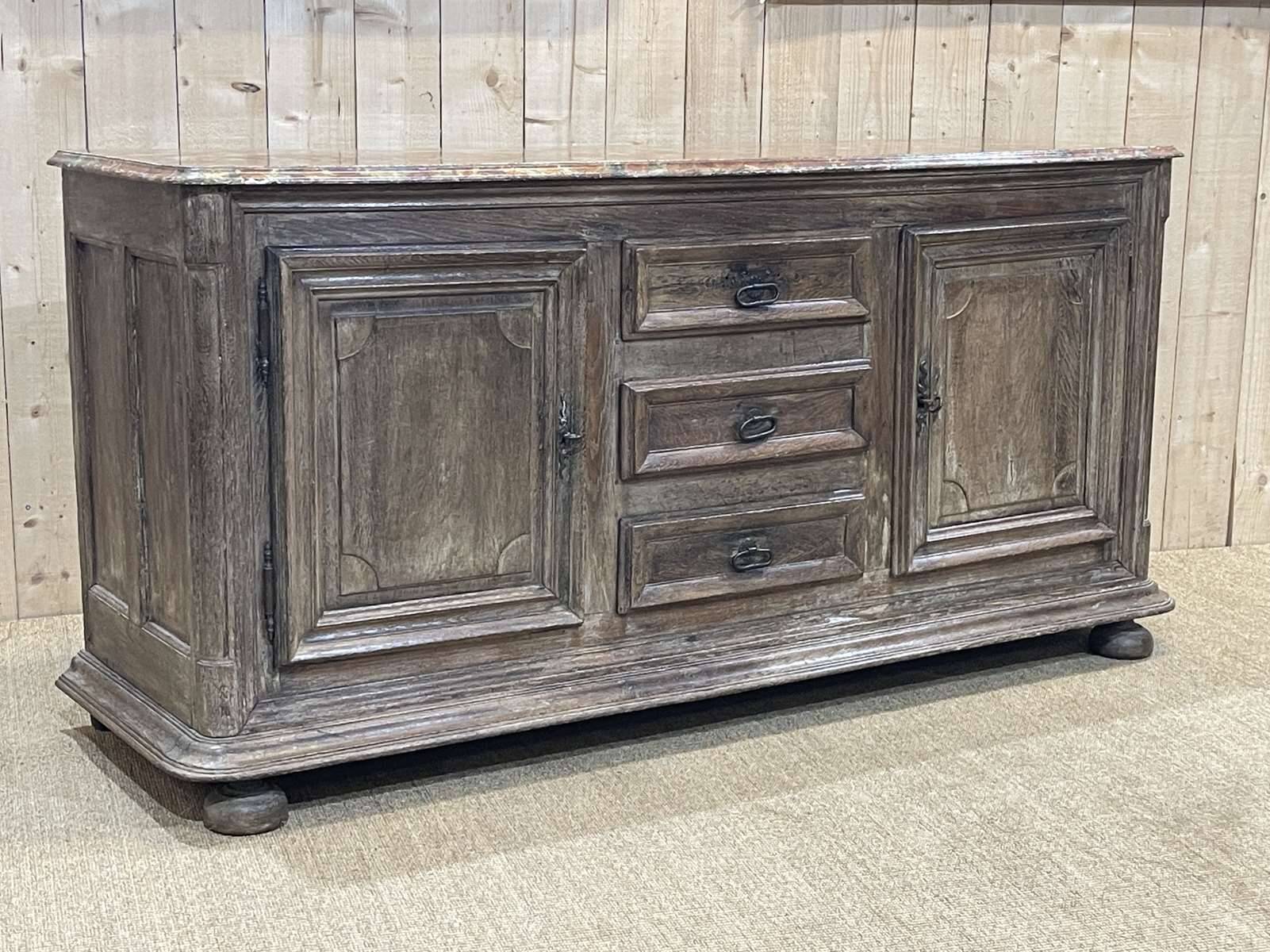 18th-century oak enfilade with a marble-effect painted top.