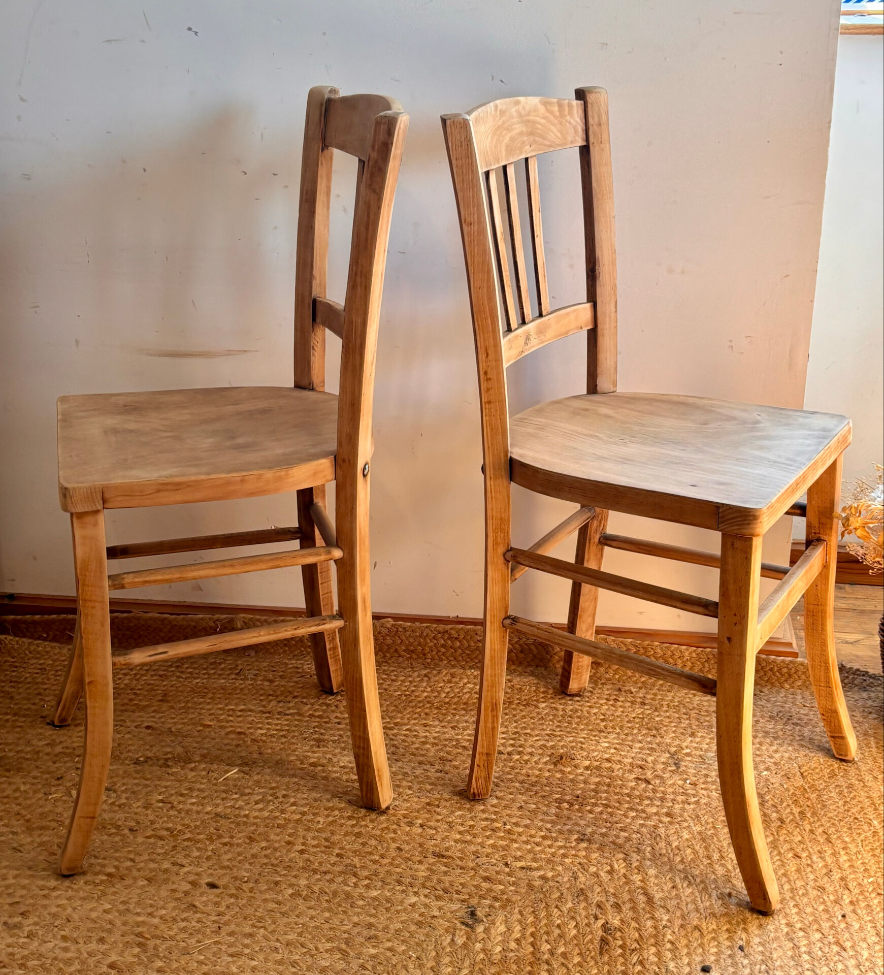 Set of 2 vintage bistro chairs in raw wood.