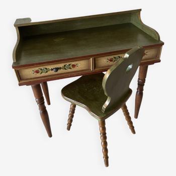 Wooden dressing table with its olive green chair and floral patterns