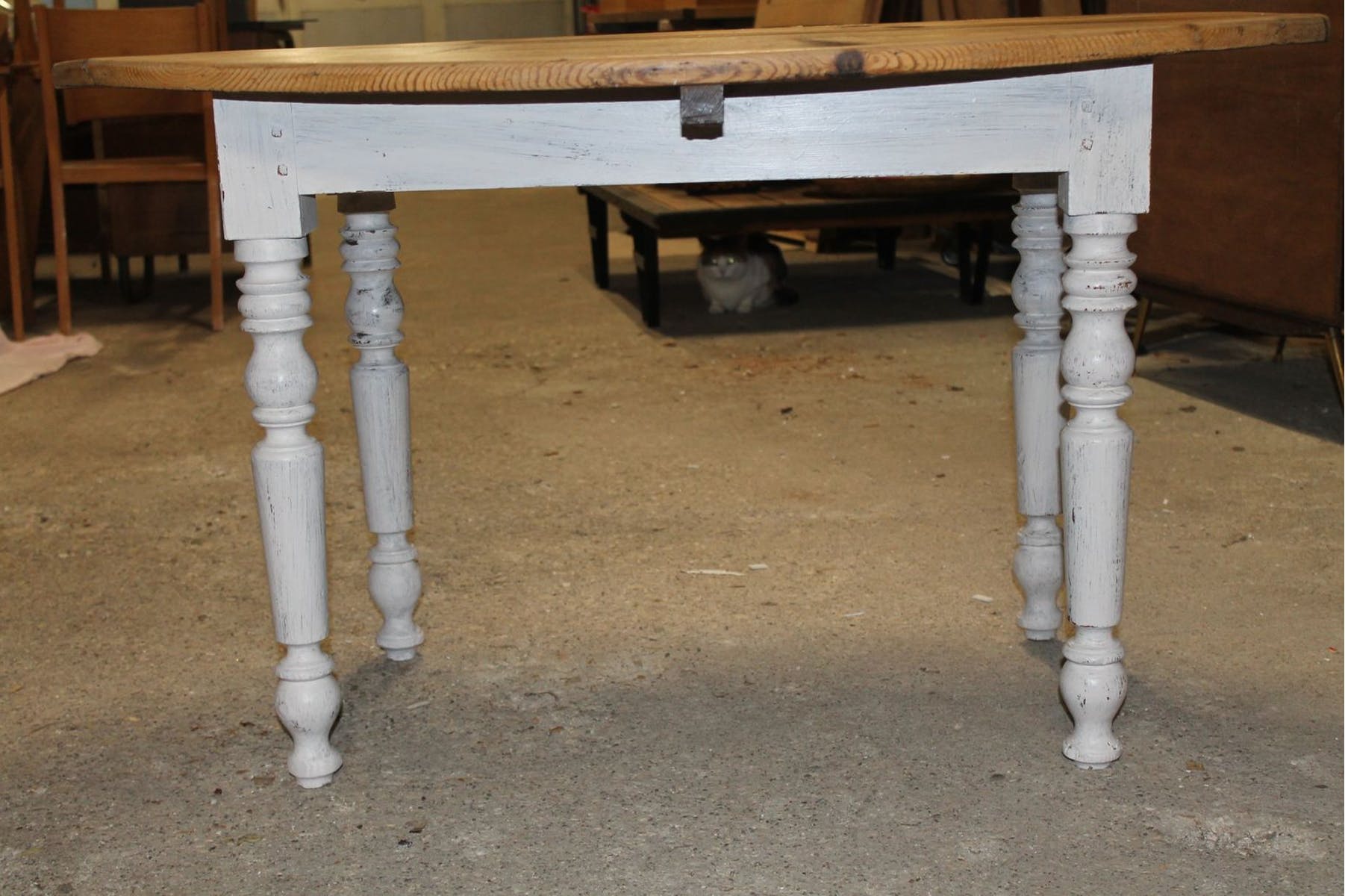 Oval table with flaps