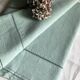 Old sheet in pure washed linen tinted in celadon green