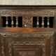 Old Renaissance bonnetière in solid oak with brown patina around 1750