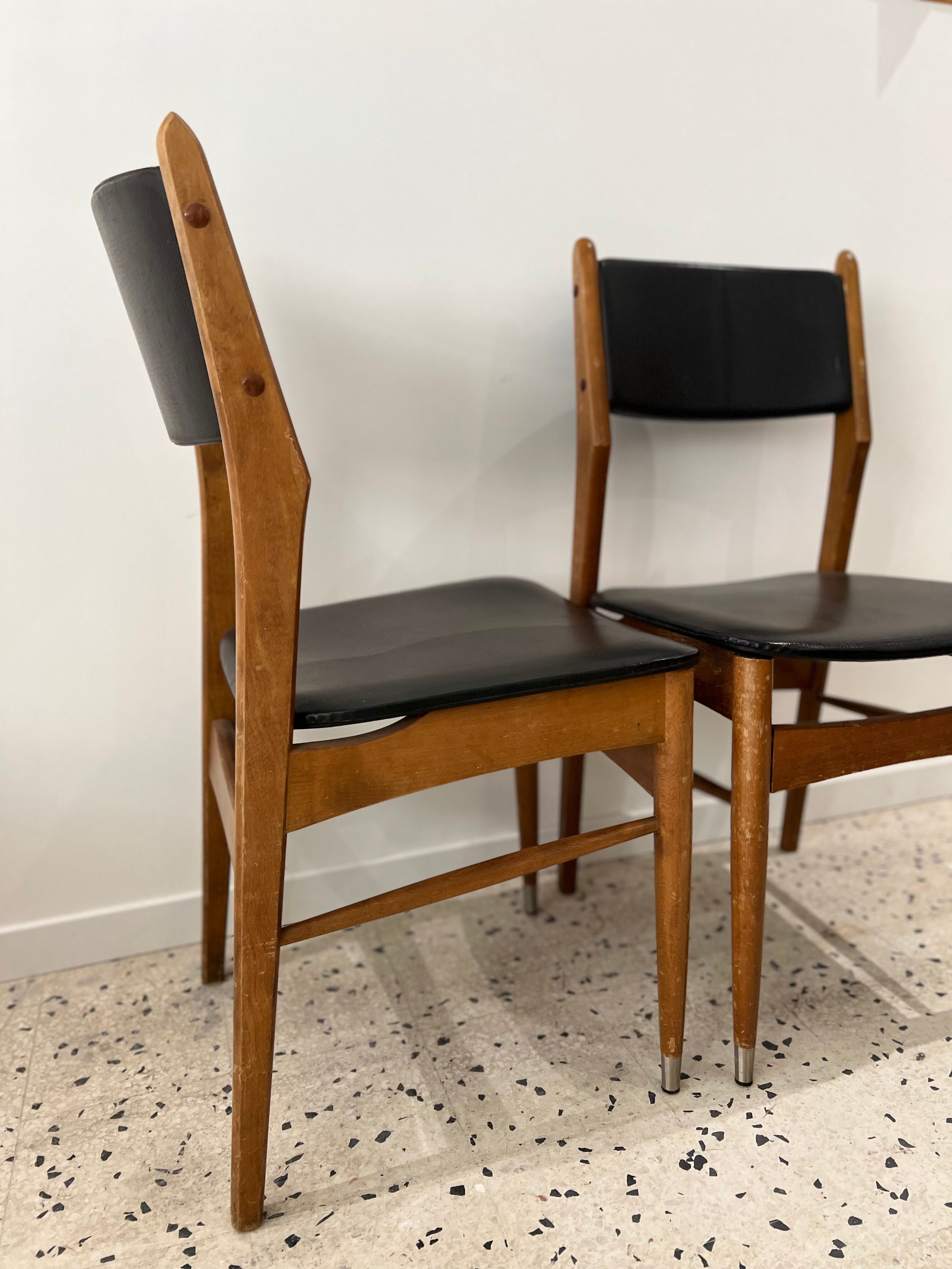 Scandinavian chair in wood and black imitation leather