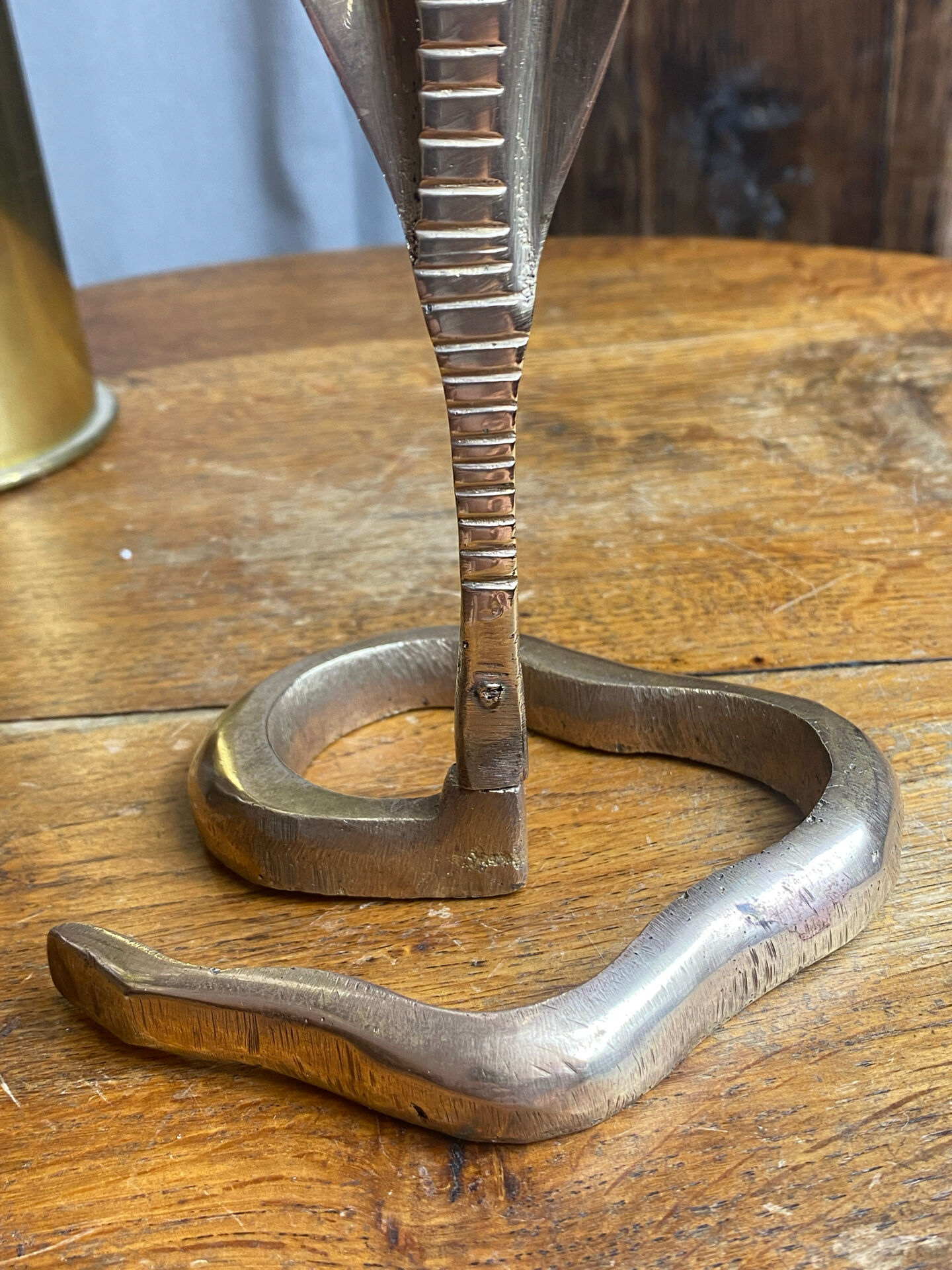 Cobra candlestick in brass
