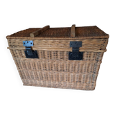 Wicker travel trunk XIX with metal clasps and handles.