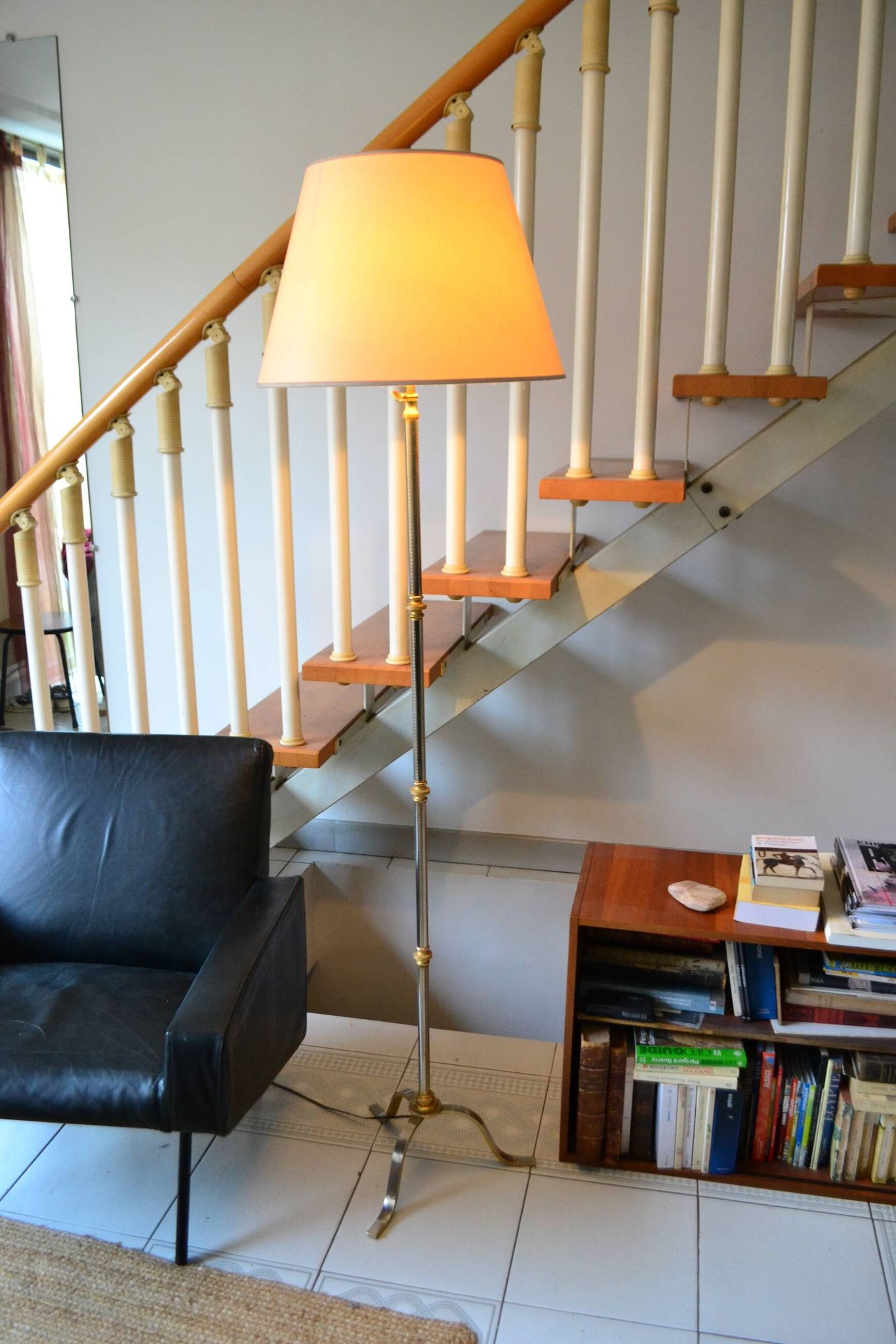 Vintage extendable tripod floor lamp in gold brass.