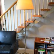 Vintage extendable tripod floor lamp in gold brass.