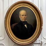 Oil on canvas portrait of a man, late 19th century, oval frame gilded with gold leaf.