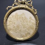 Old photograph of soldiers in a brass frame