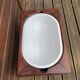 Antique bidet circa 1900, wood and porcelain