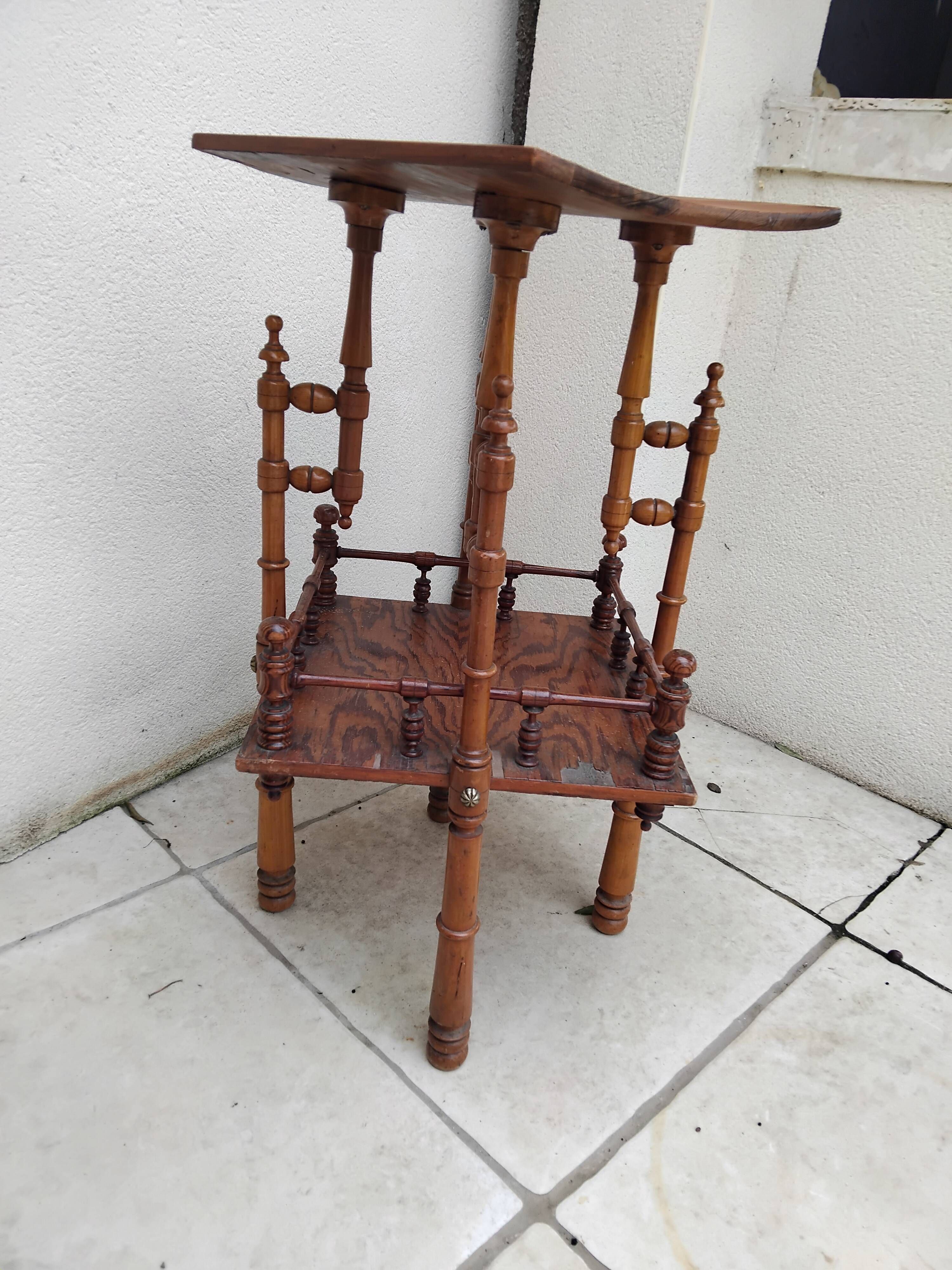 Antique pedestal table in Asian Japonese style.