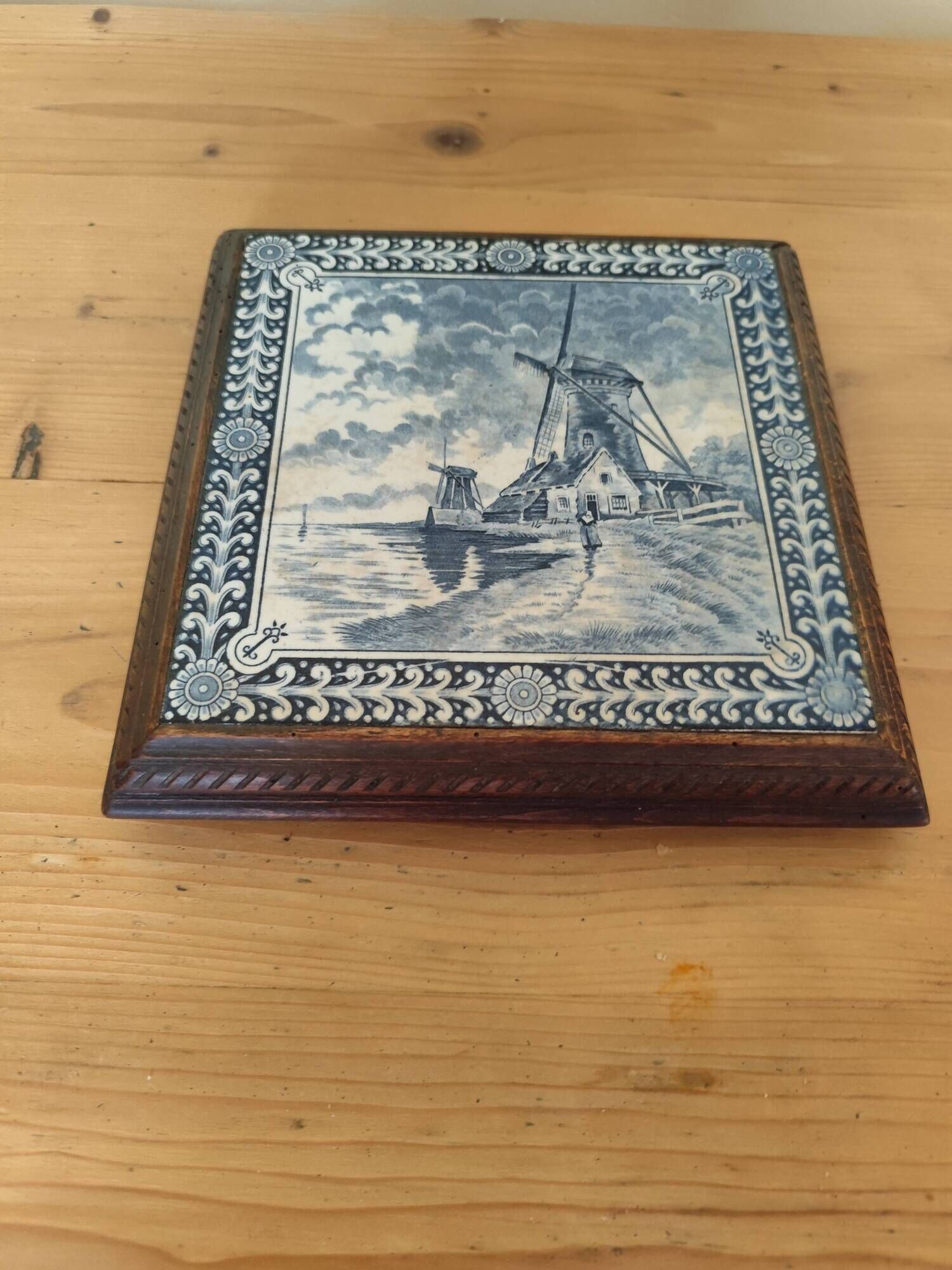 Ceramic tile trivet and wooden frame with Dutch windmill.