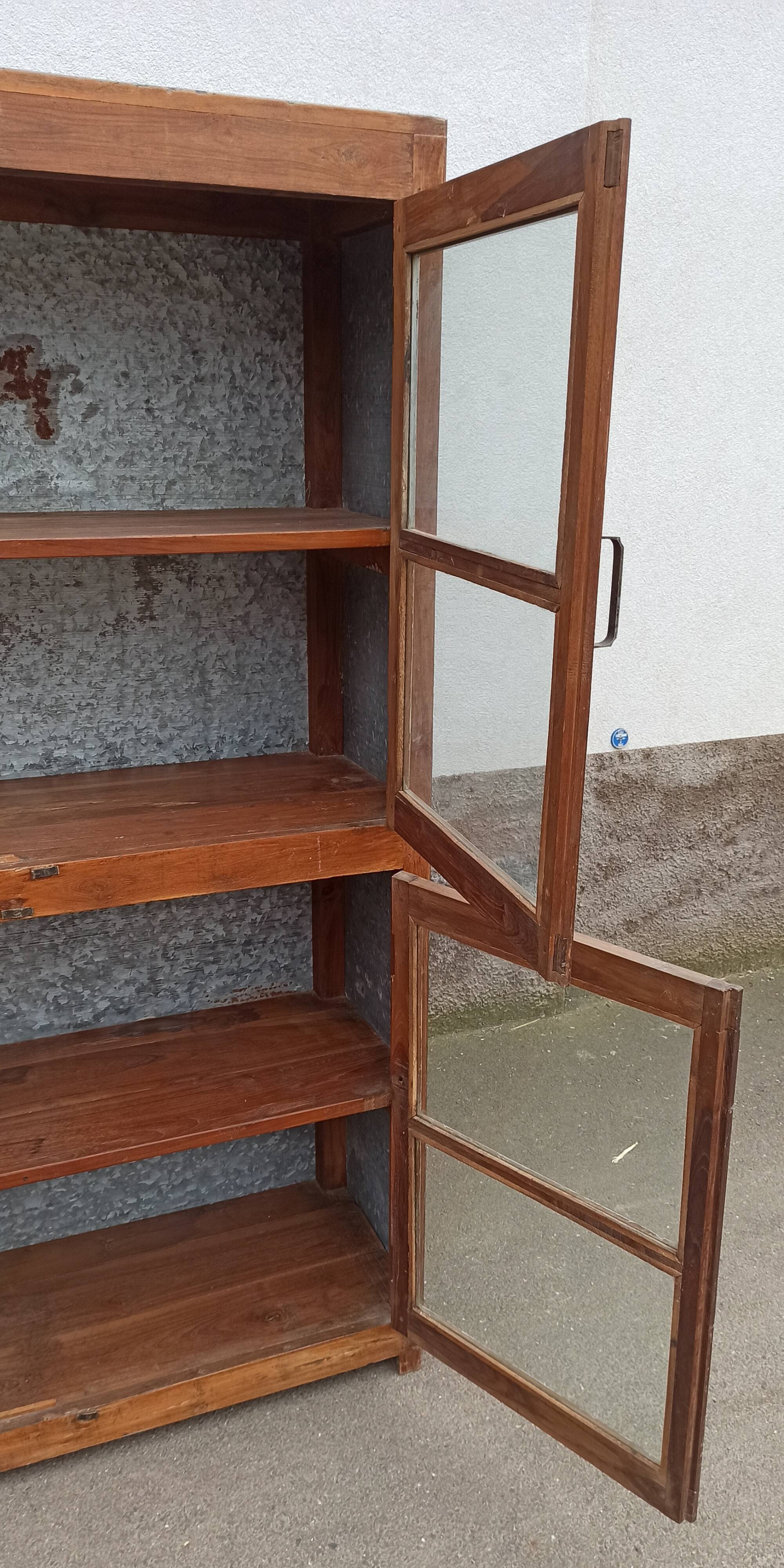 Old glass cabinet in wood and metal