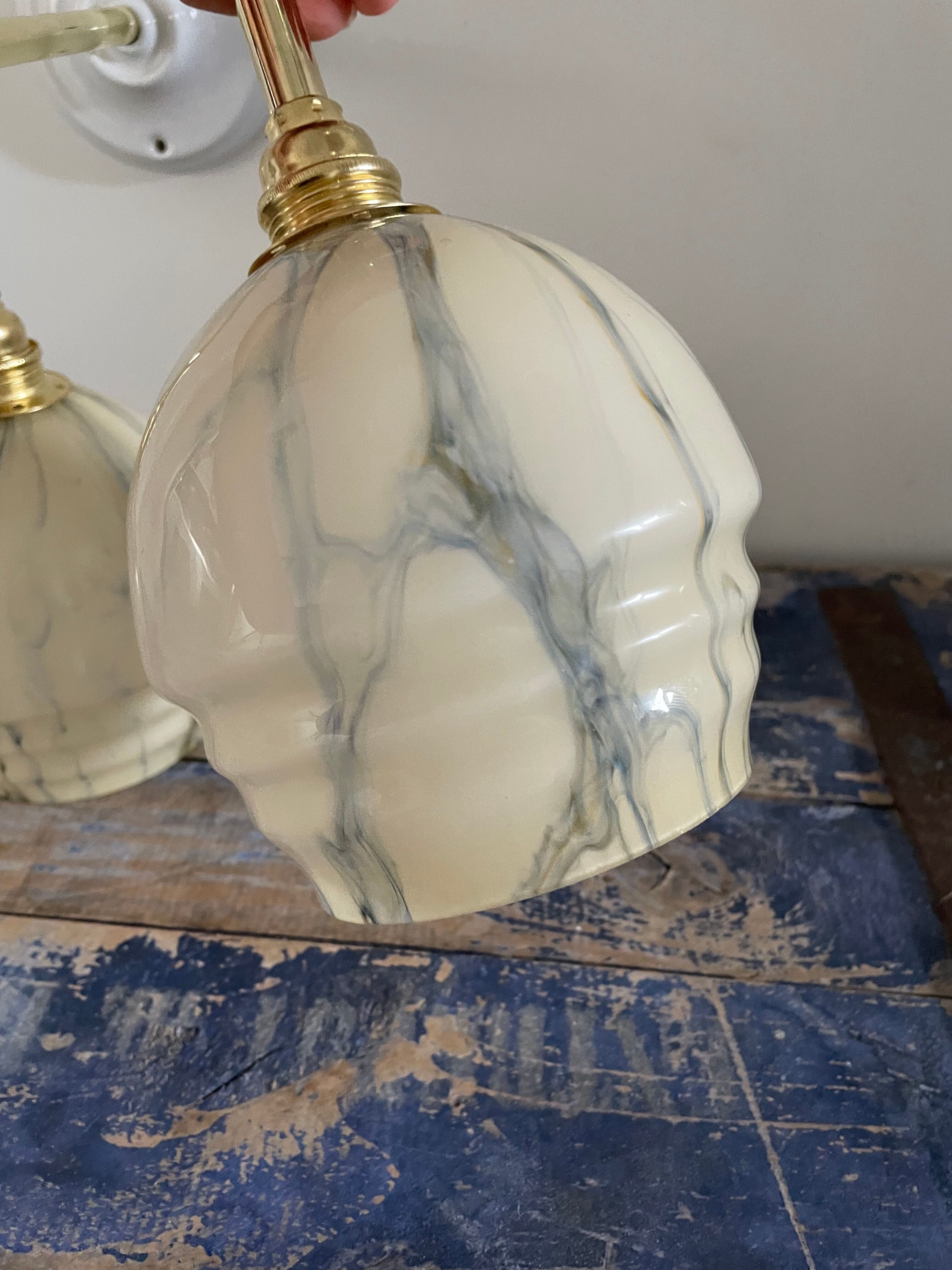 Pair of art deco wall lamps in marbled opaline