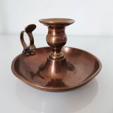 Set of a pair of candle holders and a hand candle holder