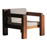 Handcrafted armchair in solid wood and fabric, 1980s-90s.