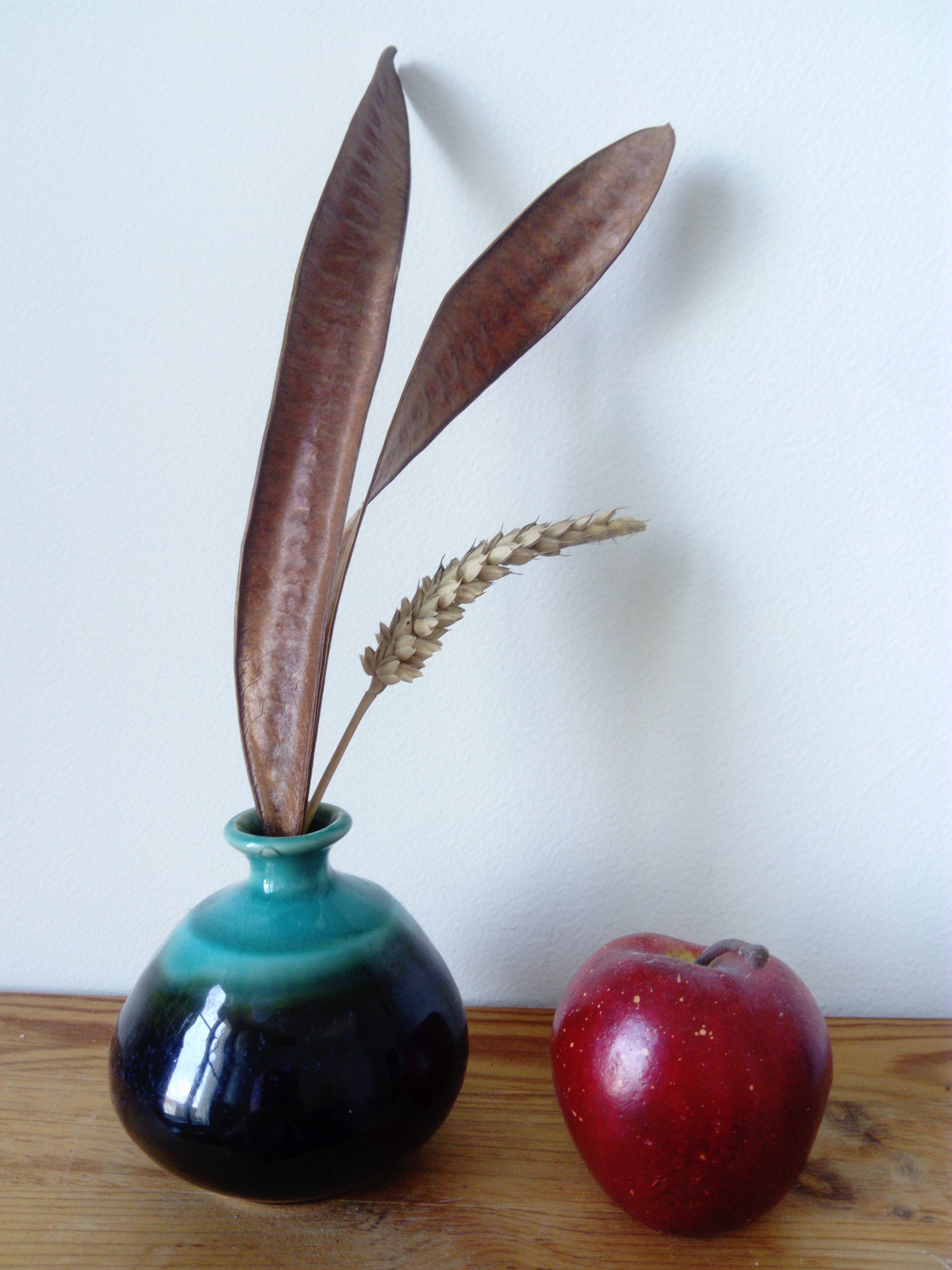 Small brown and turquoise ceramic vase