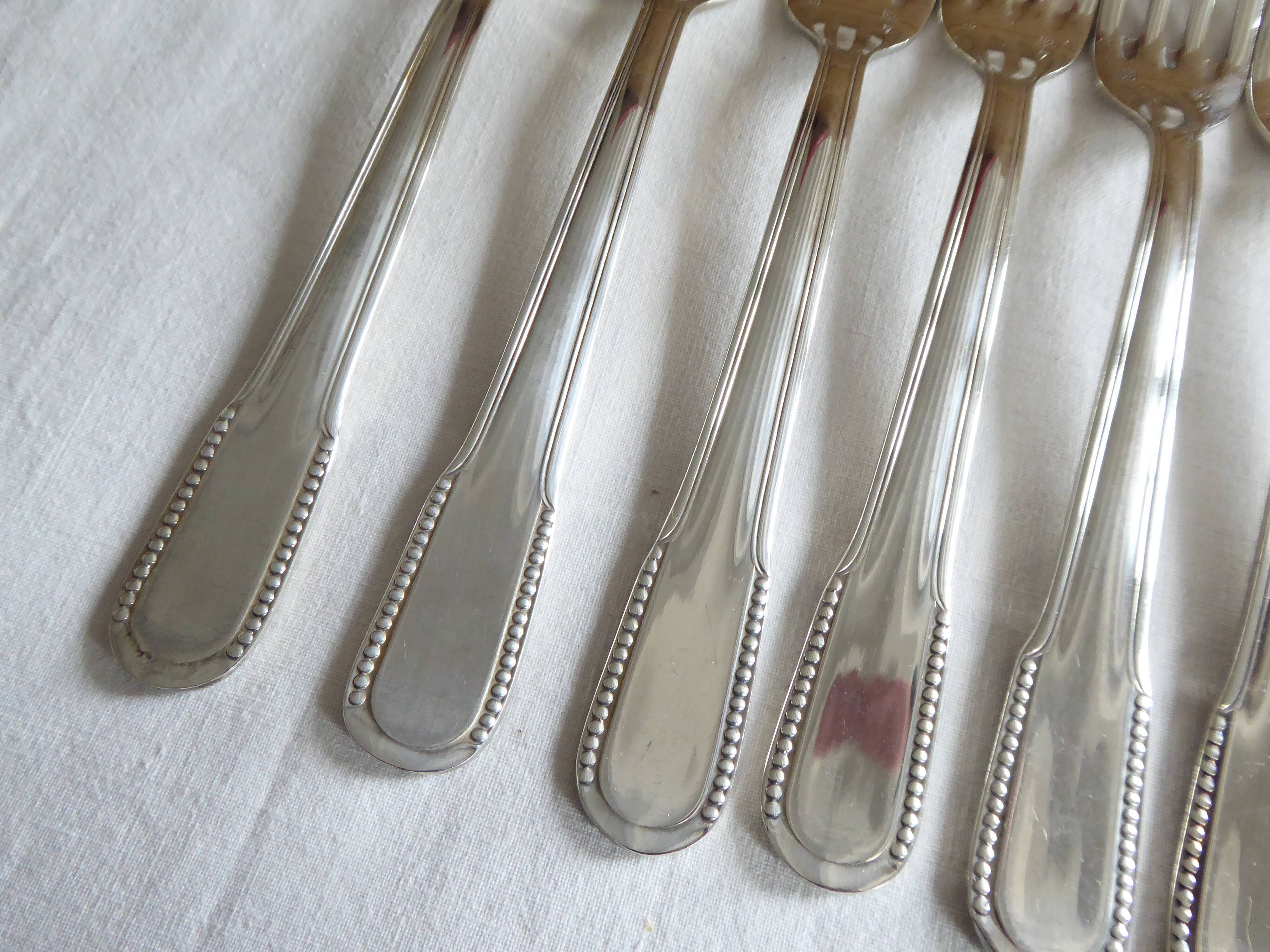 12 dessert forks, silver metal