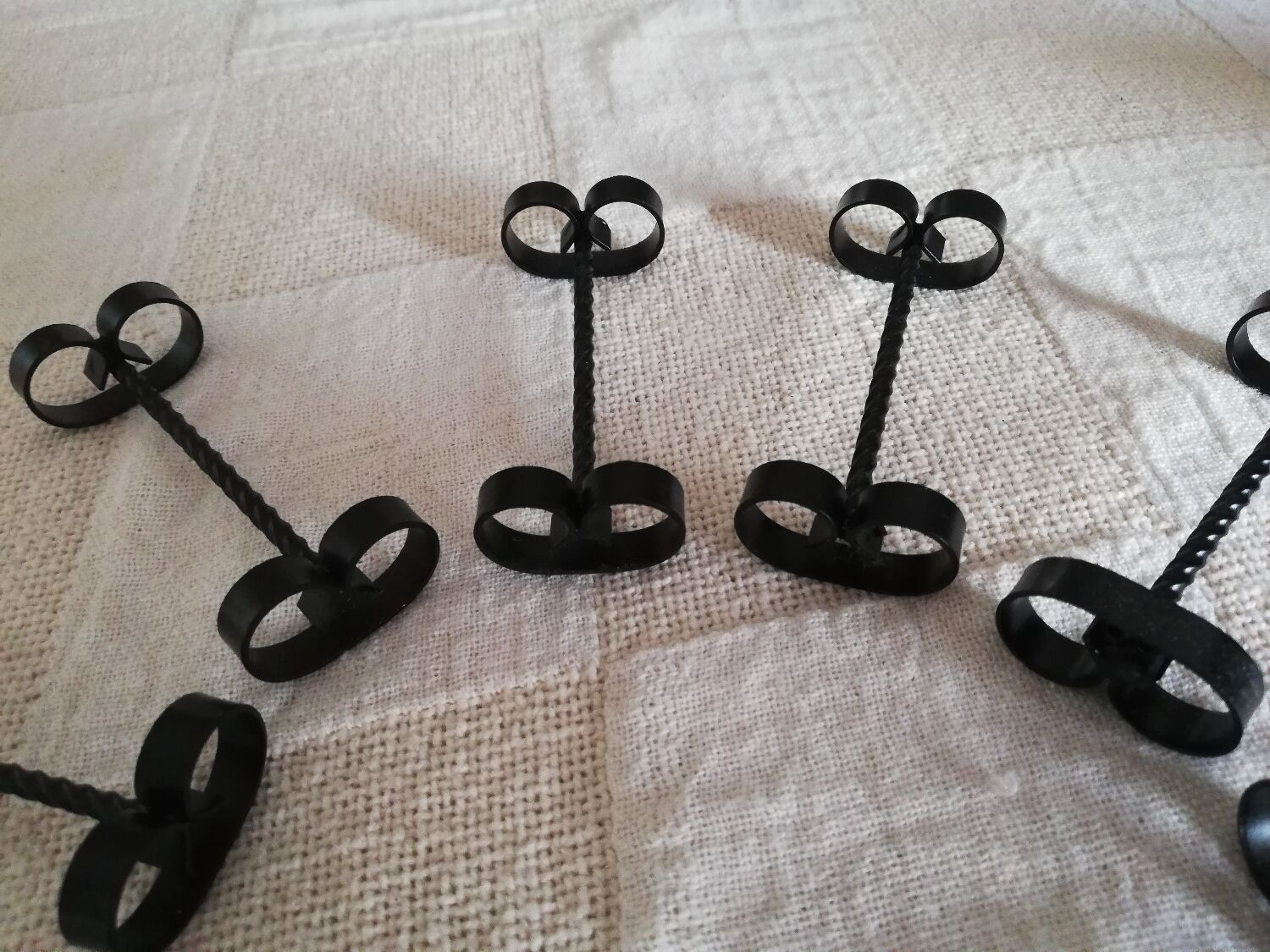 Set of 12 black twisted wrought iron knife holders from the 50s