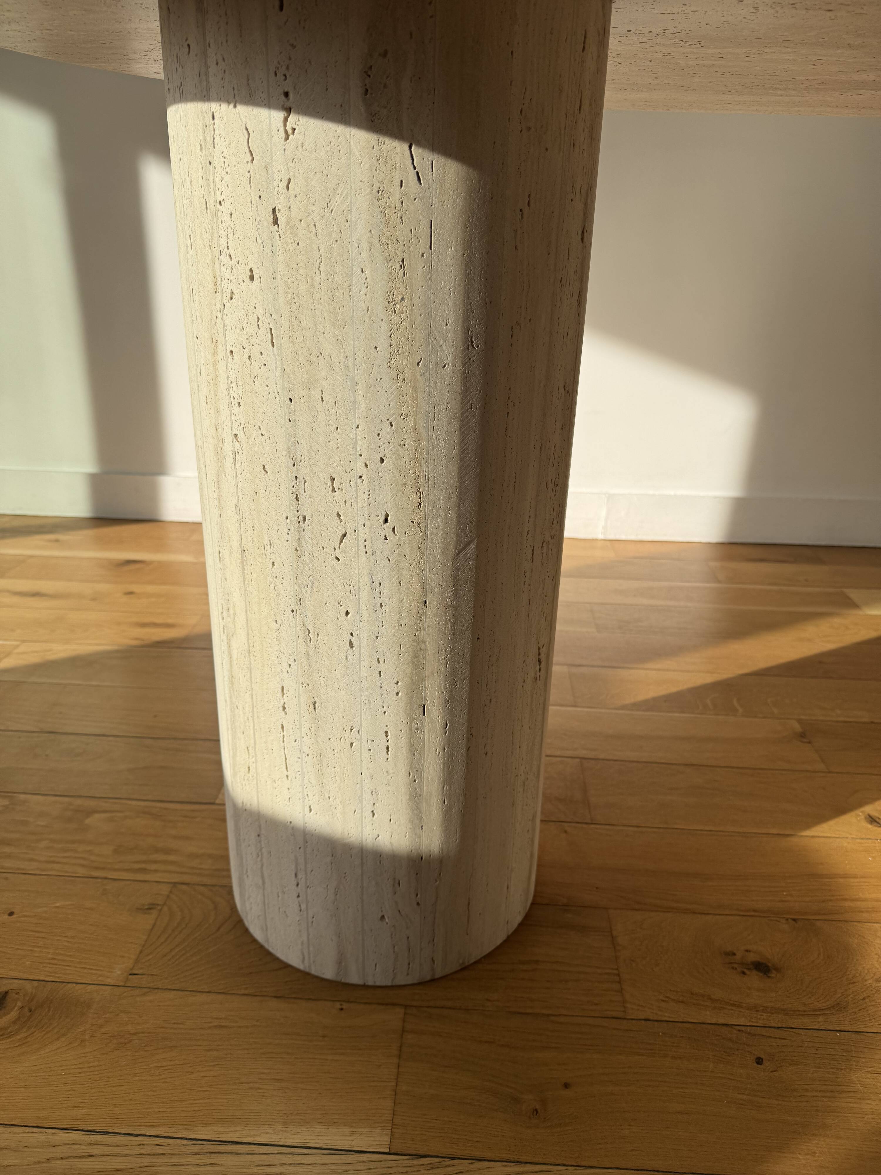 Dining table in natural travertine.