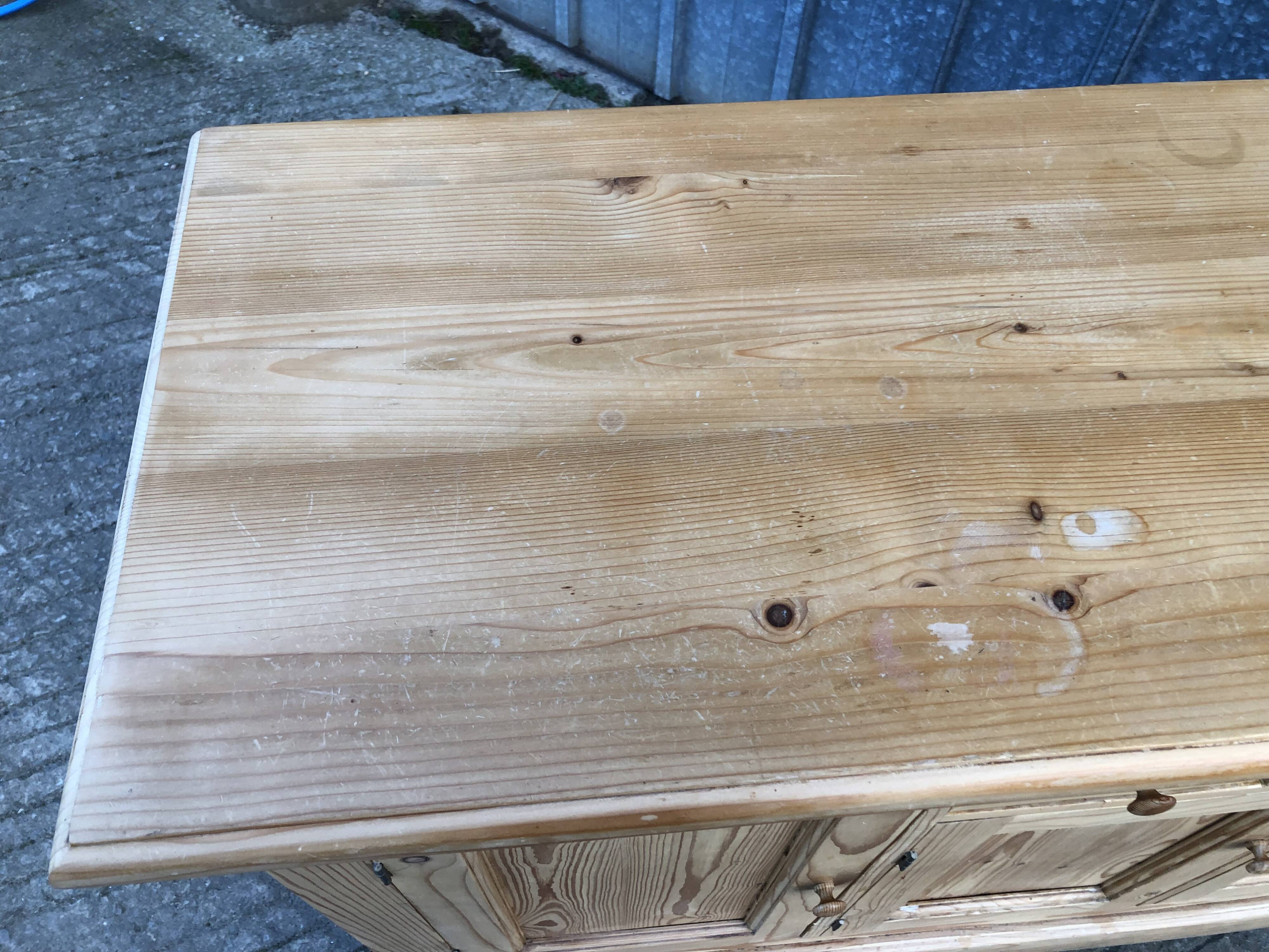 Scandinavian natural pine sideboard with 4 doors and 6 drawers.