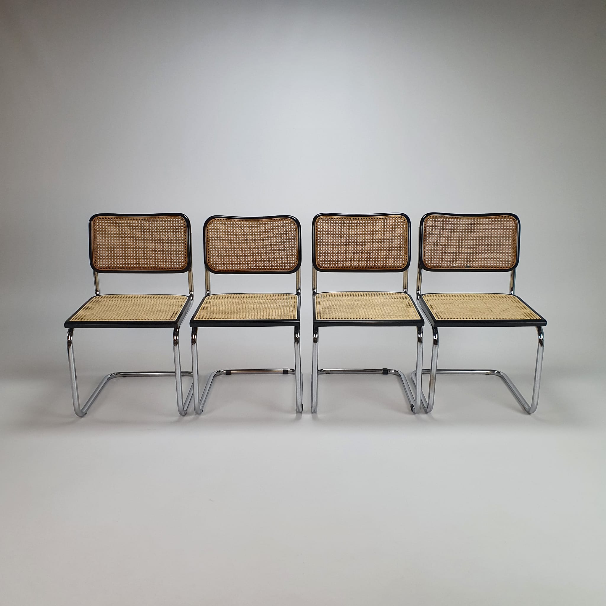 Set of 4 tubular frame and cane cantilever dining chairs Breuer Marcel italy, 1970s