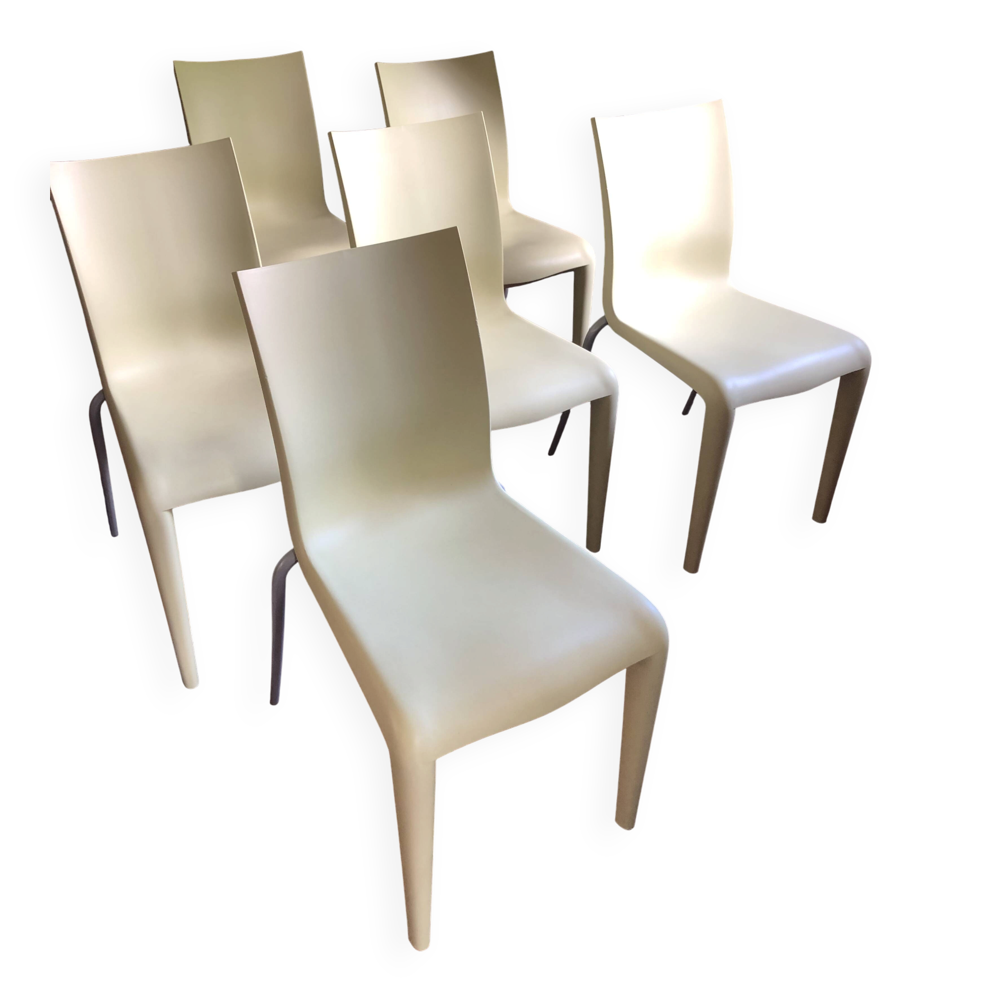 Set of 6 pale yellow vintage chairs by designer Philippe Starck.