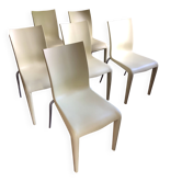 Set of 6 pale yellow vintage chairs by designer Philippe Starck.