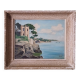 Vintage painting of a coastal landscape with a solitary fisherman.
