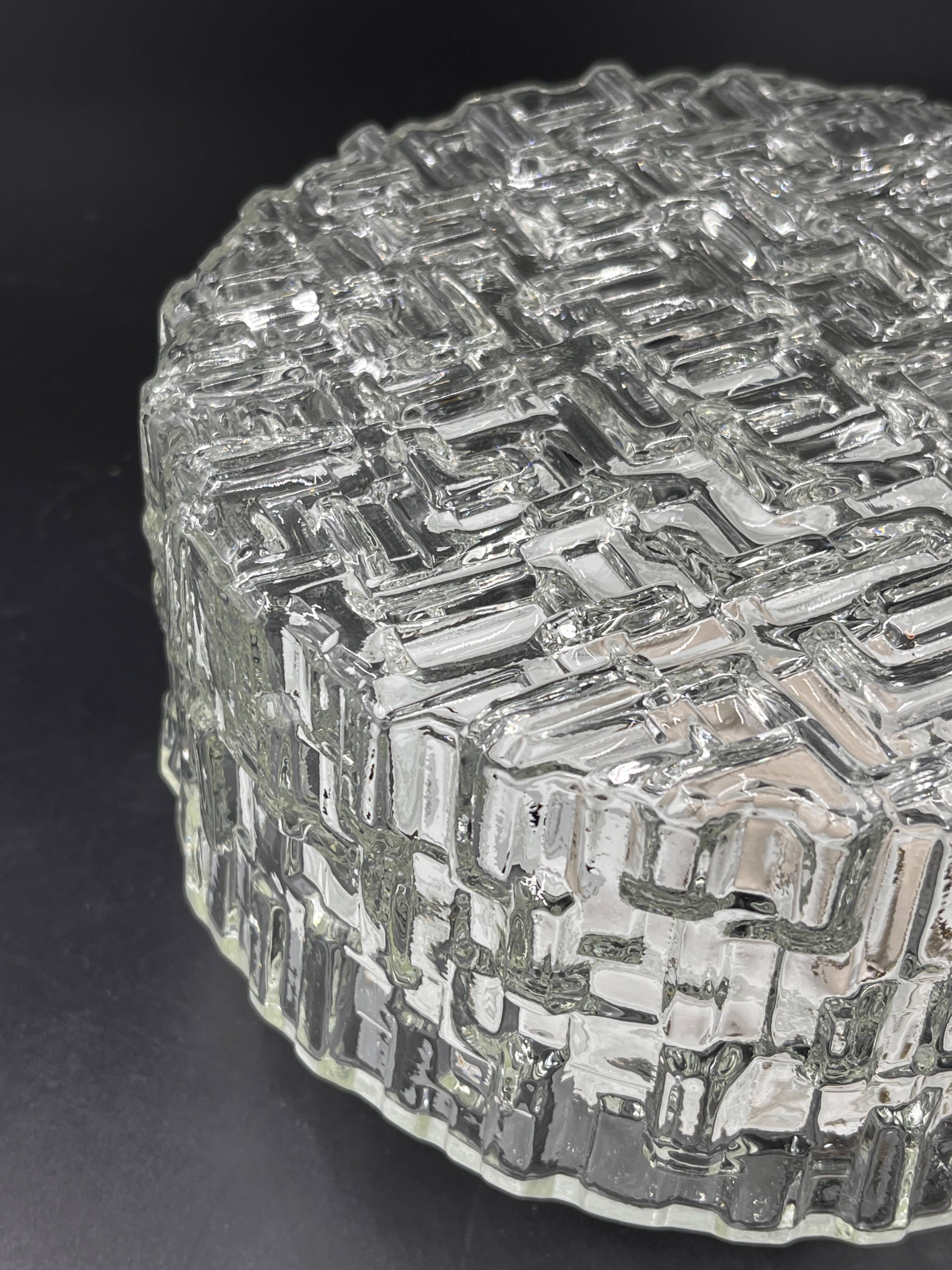 Molded glass ceiling light with relief