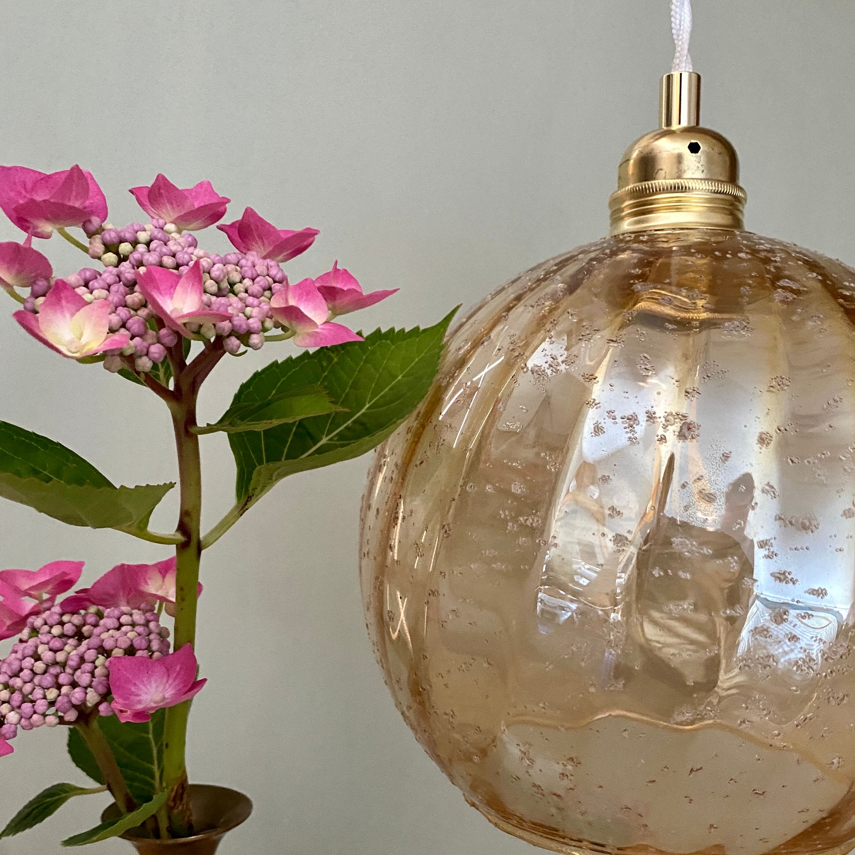 Vintage globe pendant lamp in amber glass