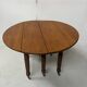 Louis Philippe six-legged table in solid cherry wood, 19th century