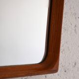 Vintage half-bust mirror with wooden frame