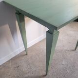 Green side table with tapered legs